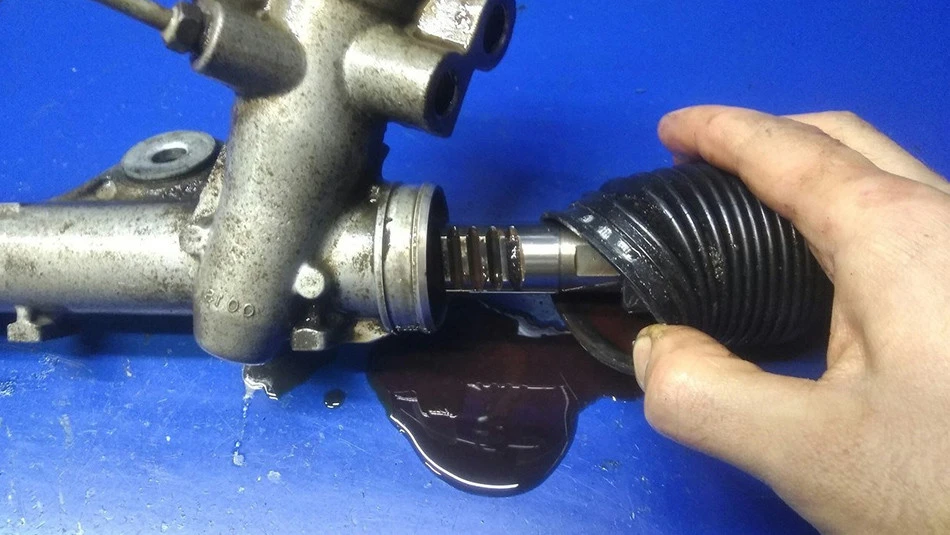Worn Rack and Pinion Symptoms Causing Steering Play and Fluid Leaks